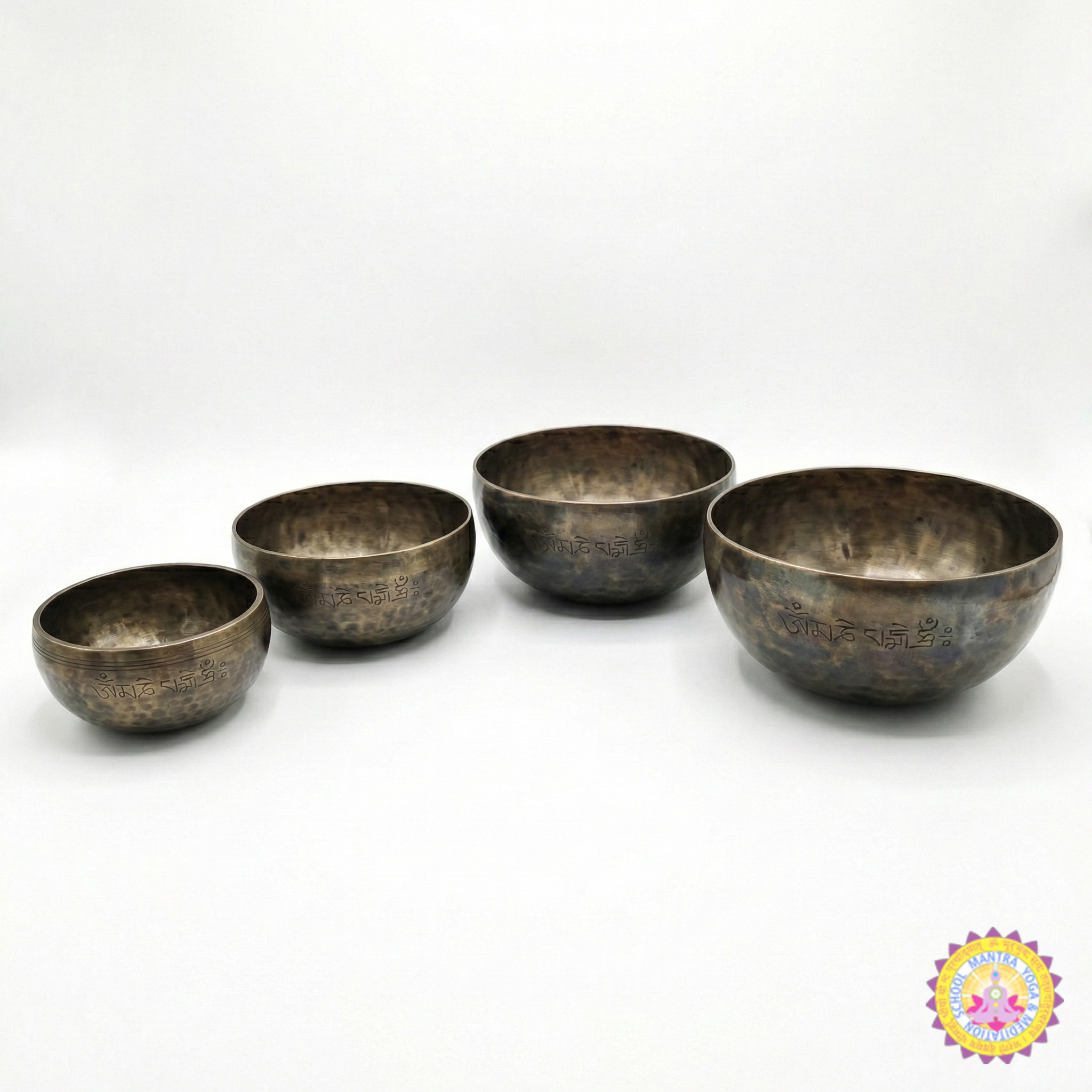 4-Piece Full Moon Metal Singing Chakra Bowl Set - Front view with all 4 bowls